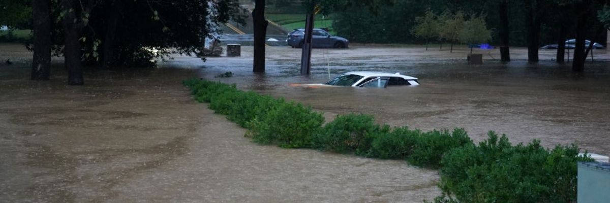 car submerged in flooding in Georgia