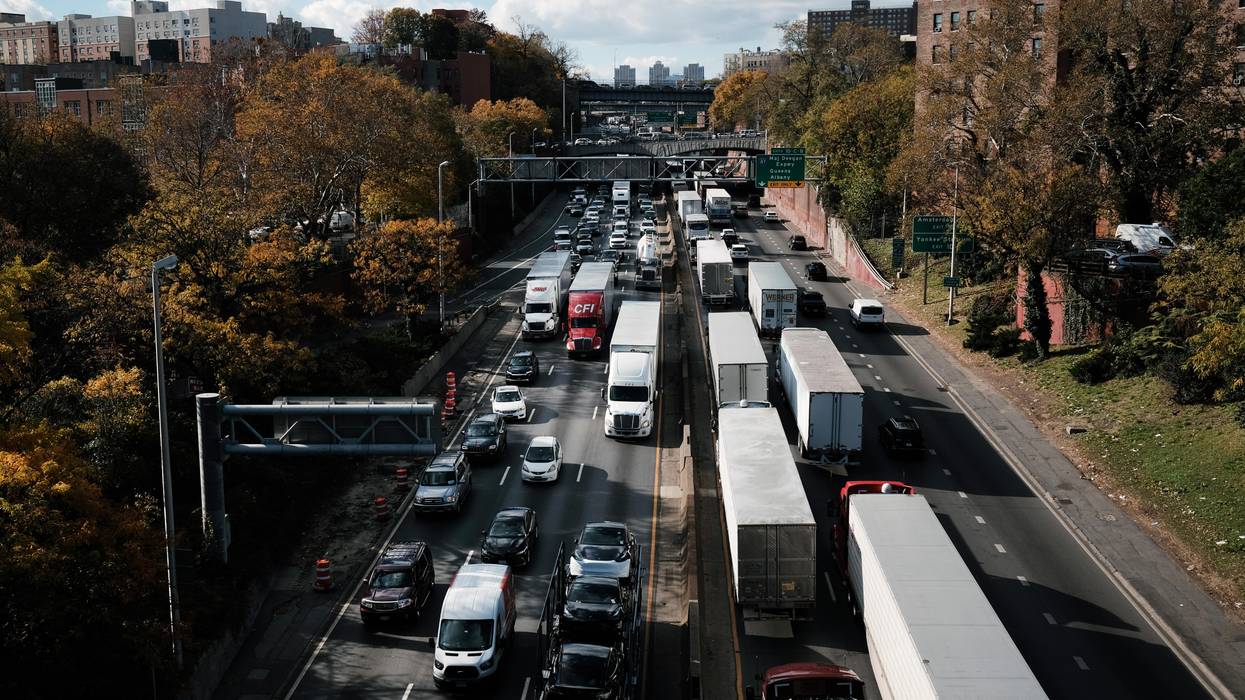 Cars and trucks move along the Cross Bronx Expressway