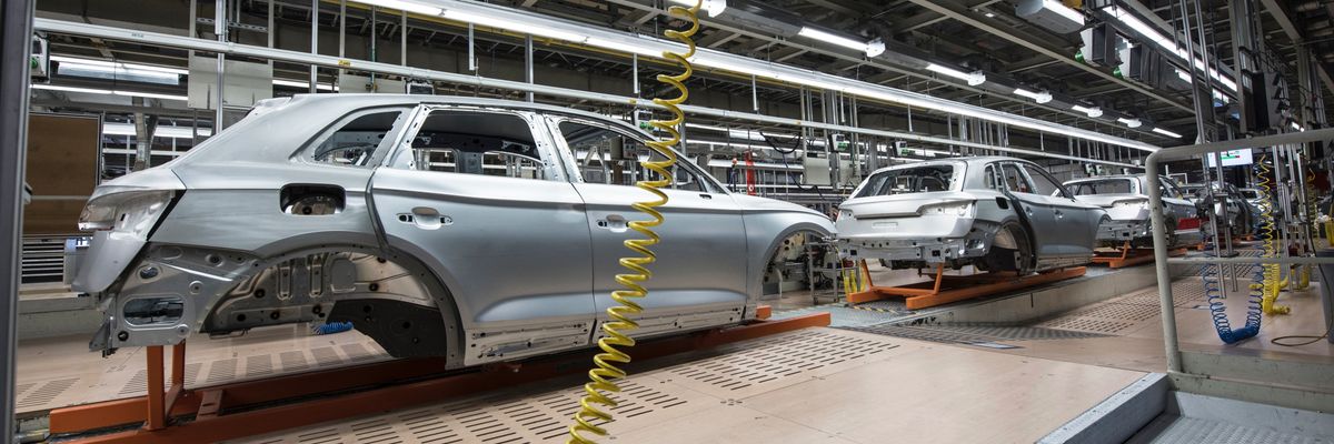 Cars on an assembly line