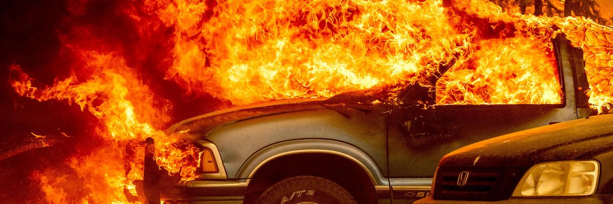 Cars on fire amid U.S. wildfires