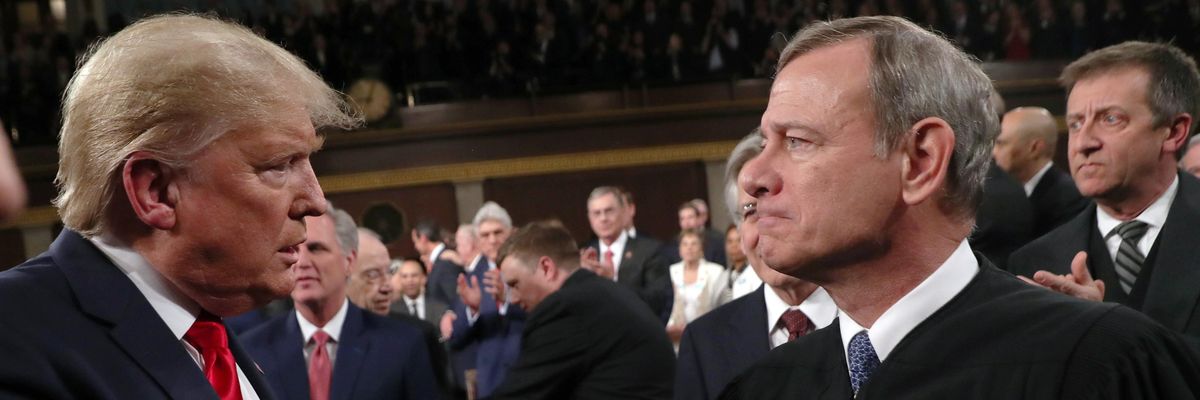 Chief Justice John Roberts shaking hands with former President Donald Trump