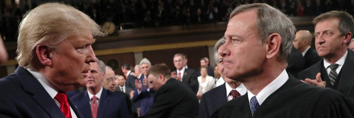 Chief Justice John Roberts shaking hands with former President Donald Trump