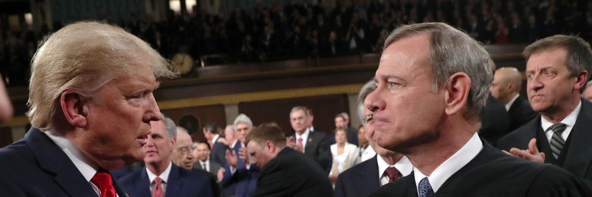 Chief Justice John Roberts shaking hands with former President Donald Trump