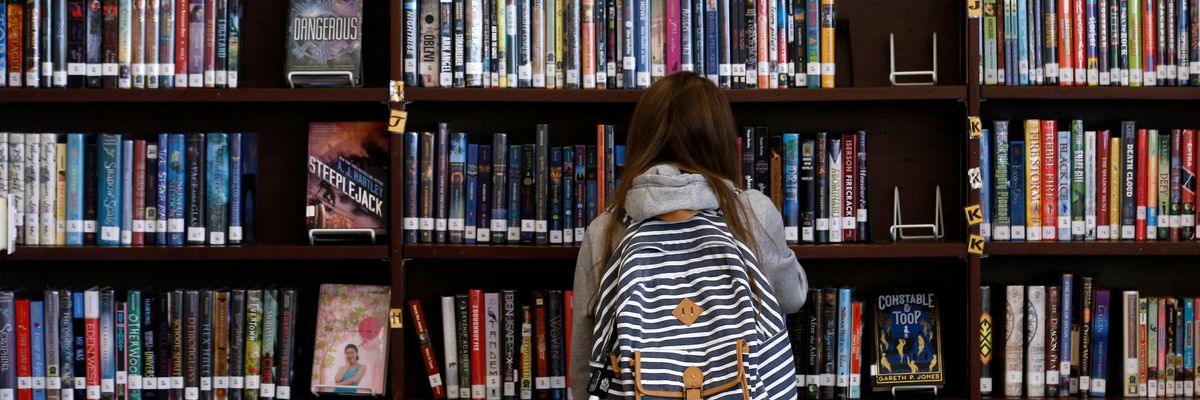 Child in a library