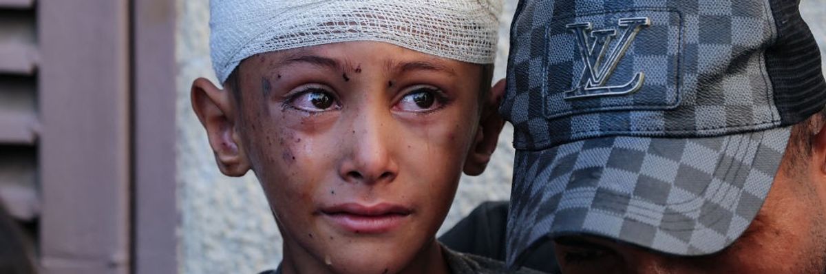 Child injured in Gaza with tears