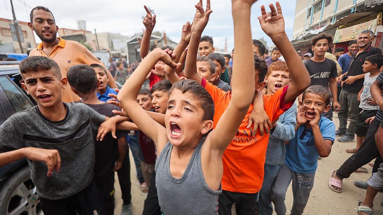 Children celebrate the Gaza ceasefire