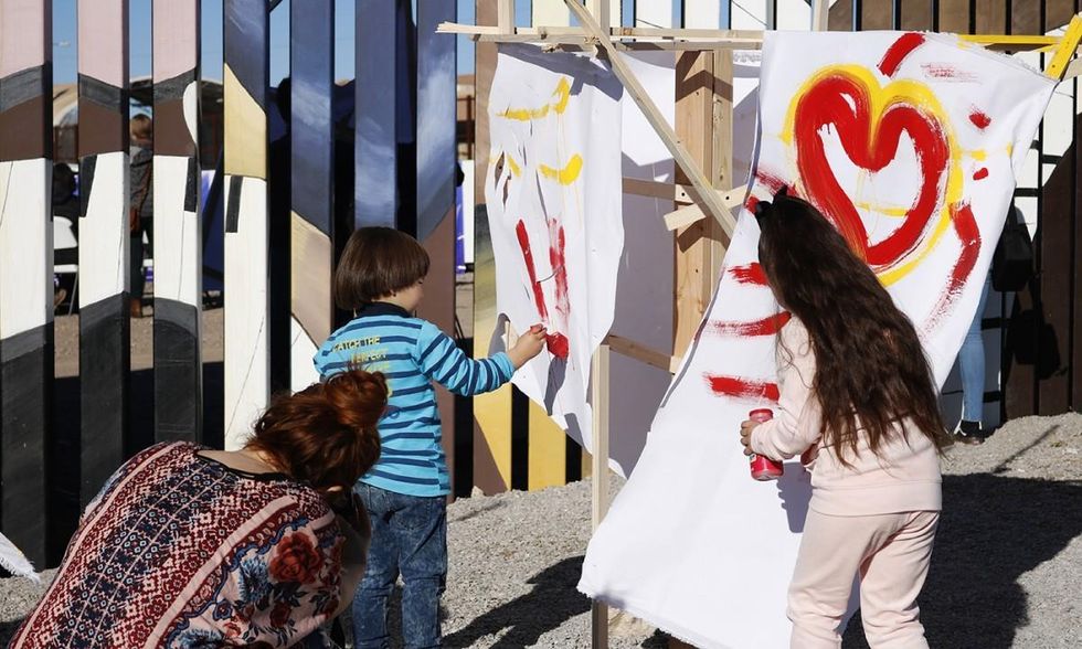 Children create art during a binational festival celebrating the border towns of Douglas, Arizona, and Agua Prieta in the Mexican state of Sonora. (Photo: Ammi Robles)