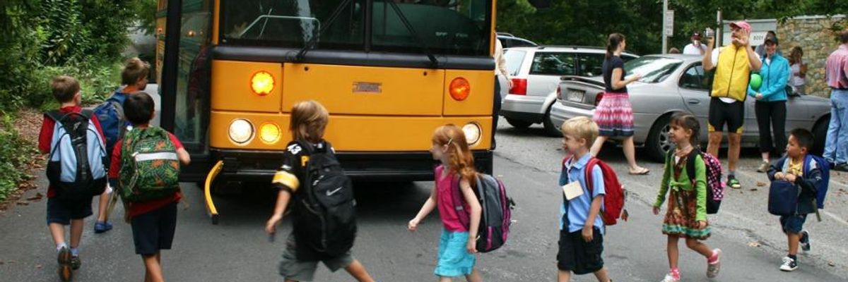 Children walking to school bus