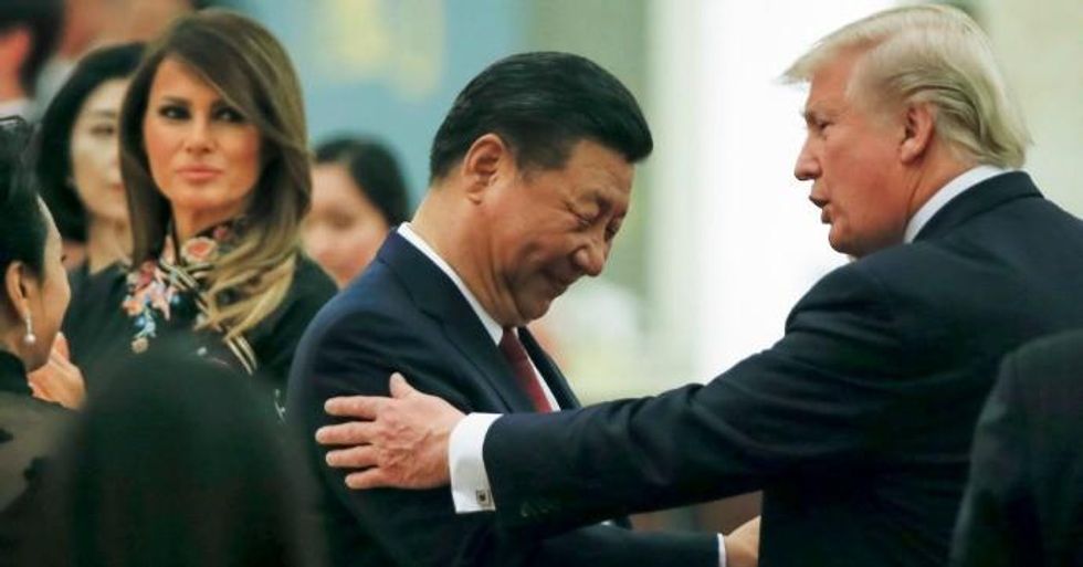 China's President Xi Jinping and China's first lady Peng Liyuan and U.S. President Donald Trump and first lady Melania attend a state dinner at the Great Hall of the People on November 9, 2017 in Beijing, China. Trump is on a 10-day trip to Asia. (Photo: Thomas Peter--Pool/Getty Images)