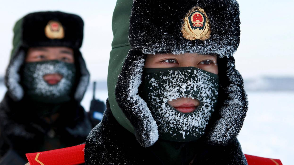 Chinese paramilitary police border guards train in the snow at Mohe County in China's northeast Heilongjiang province, on the border with Russia, on December 12, 2016.