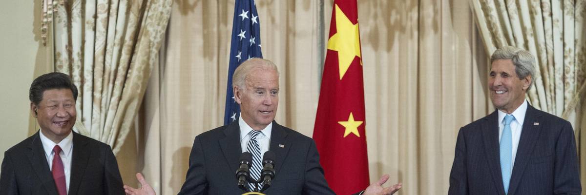 Chinese President Xi Jinping and then-U.S. Secretary of State John Kerry listen as then-U.S. Vice President Joe Biden speaks during a luncheon hosted by Kerry on September 25, 2015 in Washington, D.C. (Photo: Paul J. Richards/AFP via Getty Images)