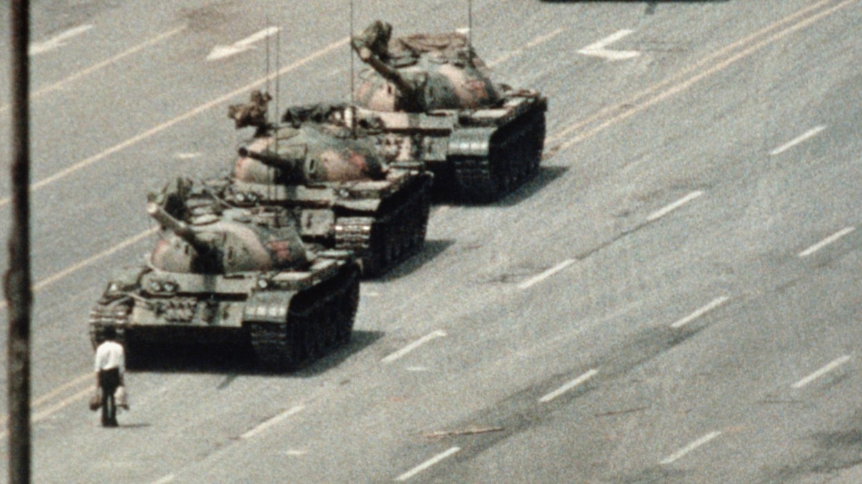 Chinese protester stands before tanks at 1989 protests in Tiananmen Square.