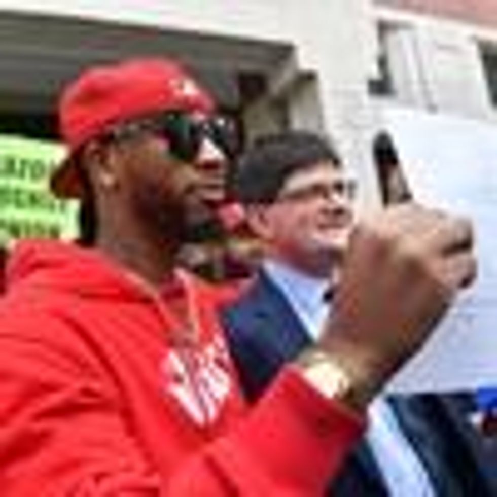 Christian Smalls celebrates with Amazon workers