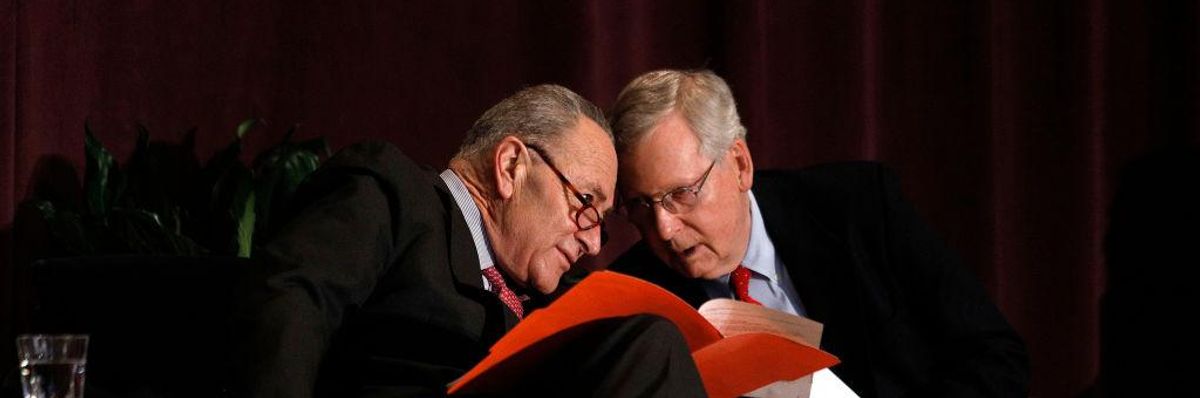 Chuck Schumer and Mitch McConnell speak at an event