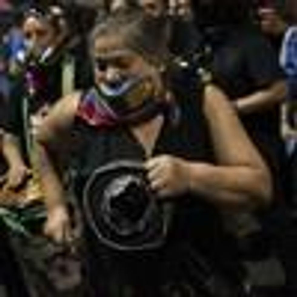 Citizens in favor of rewriting the Chilean constitution celebrate while awaiting the official results of the referendum at Plaza Italia Square in Santiago, Chile on October 25, 2020. (Photo: Alejandro Olivares/Anadolu Agency via Getty Images)