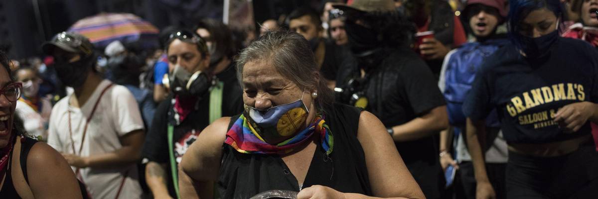 Citizens in favor of rewriting the Chilean constitution celebrate while awaiting the official results of the referendum at Plaza Italia Square in Santiago, Chile on October 25, 2020. (Photo: Alejandro Olivares/Anadolu Agency via Getty Images)