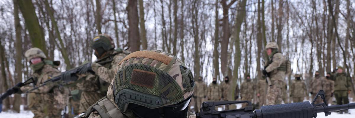 Civilian participants in a Kyiv Territorial Defense unit train on a Saturday in a forest on January 22, 2022 in Kyiv, Ukraine.