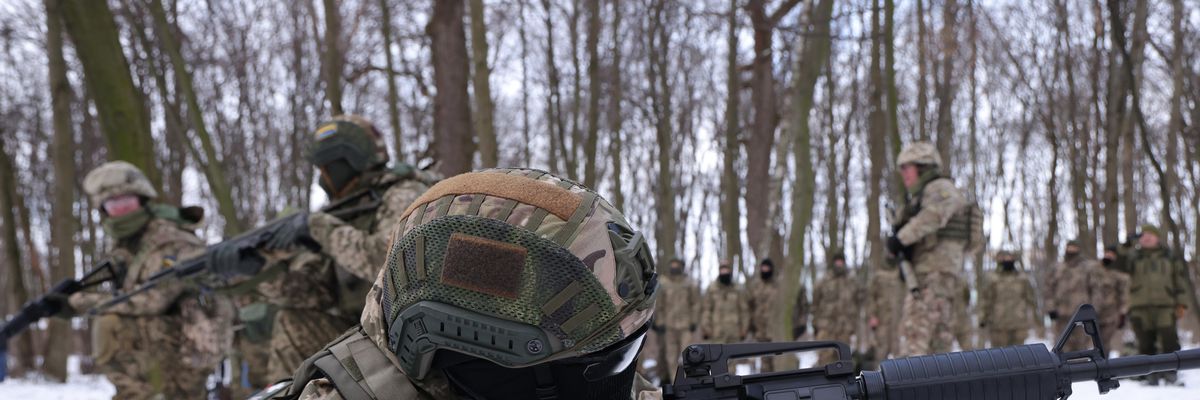 Civilian participants in a Kyiv Territorial Defense unit train on a Saturday in a forest on January 22, 2022 in Kyiv, Ukraine.