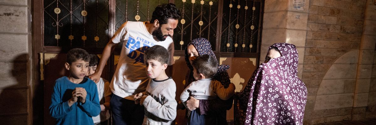 Civilians are seen in the streets of Gaza City after Israeli warplanes launched airstrikes on May 9, 2023.