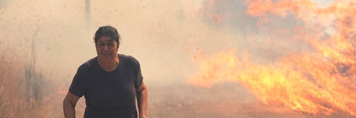 Civilians flee a forest fire in Turkey