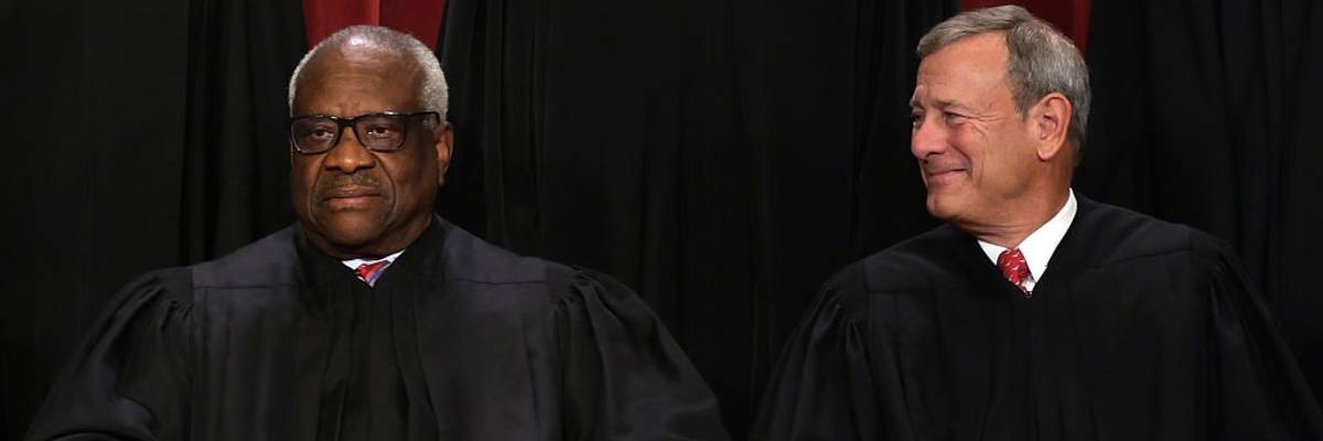 Clarence Thomas and John Roberts.