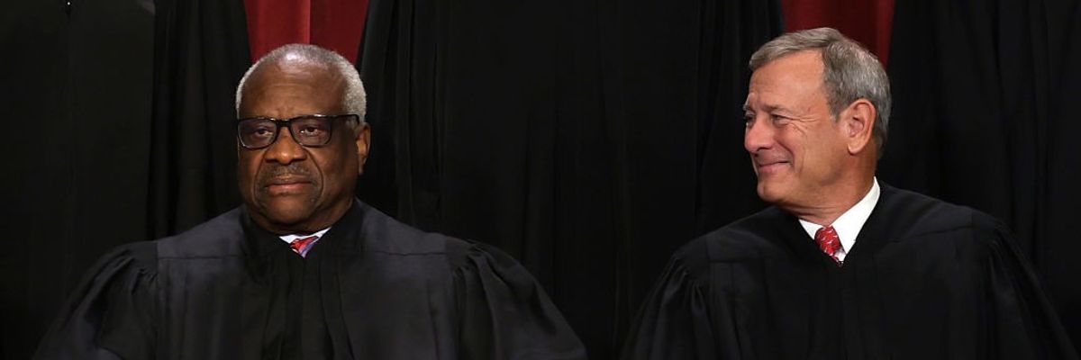 Clarence Thomas and John Roberts.