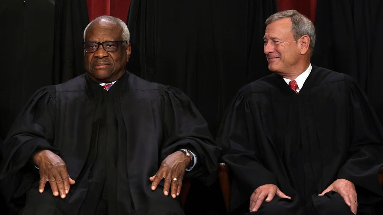 Clarence Thomas and John Roberts.
