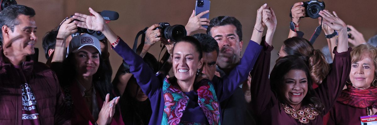 Claudia Sheinbaum waves to supporters