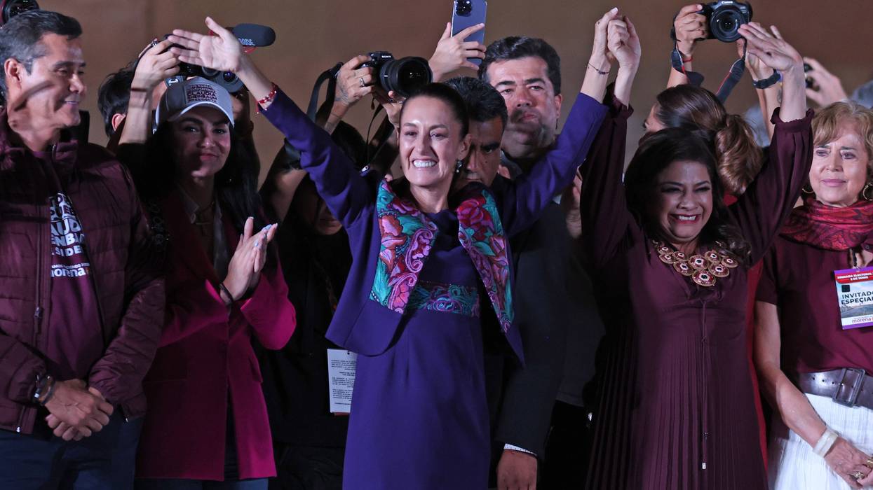 Claudia Sheinbaum waves to supporters