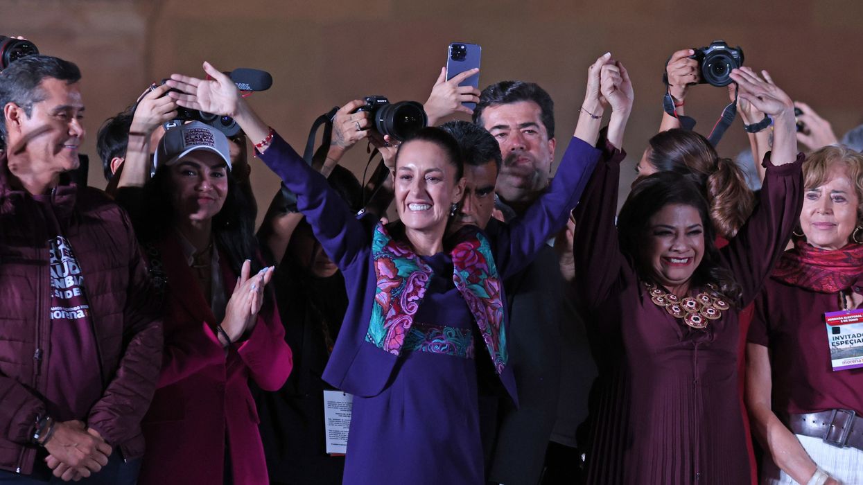Claudia Sheinbaum waves to supporters