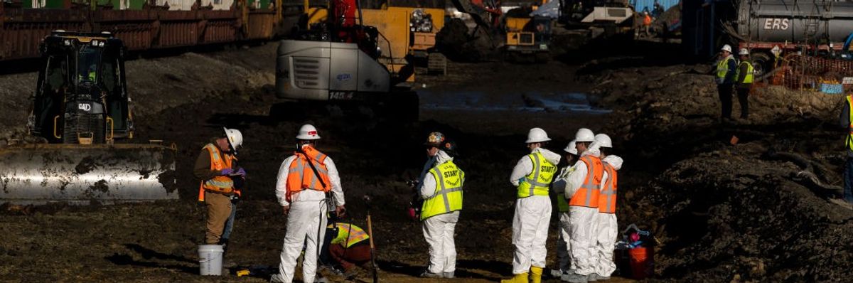 Cleanup workers gather in East Palestine, Ohio.