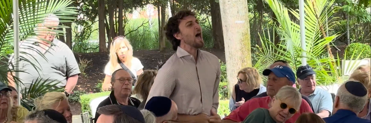 Climate activist disrupts Zeldin event.