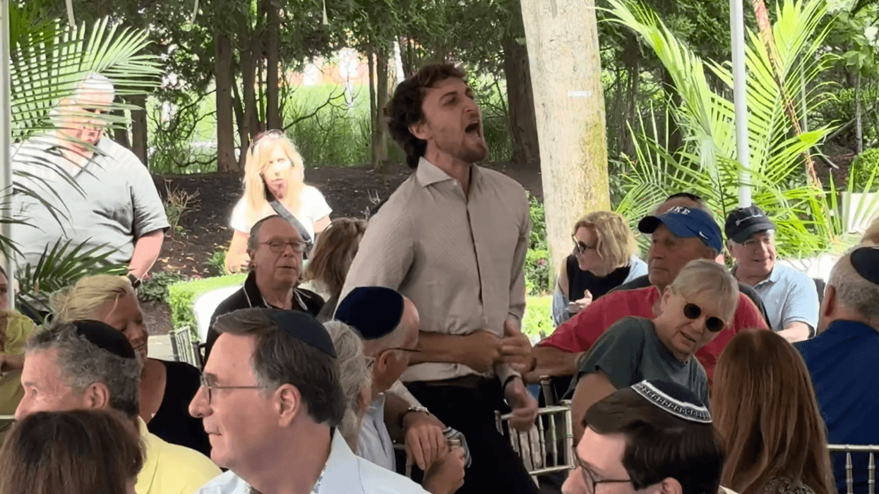 Climate activist disrupts Zeldin event.