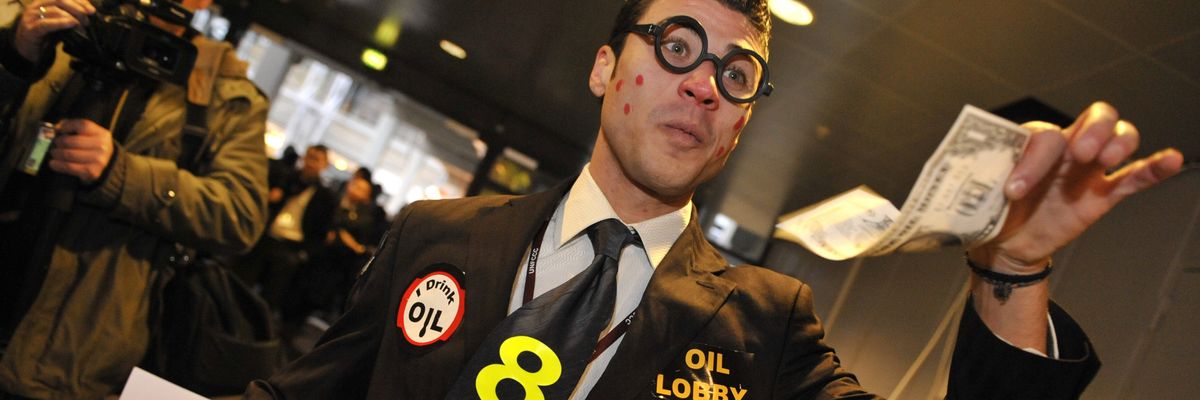 Climate activist dressed as oil lobbyist