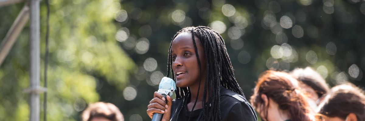 Climate activist Vanessa Nakate speaks at a rally