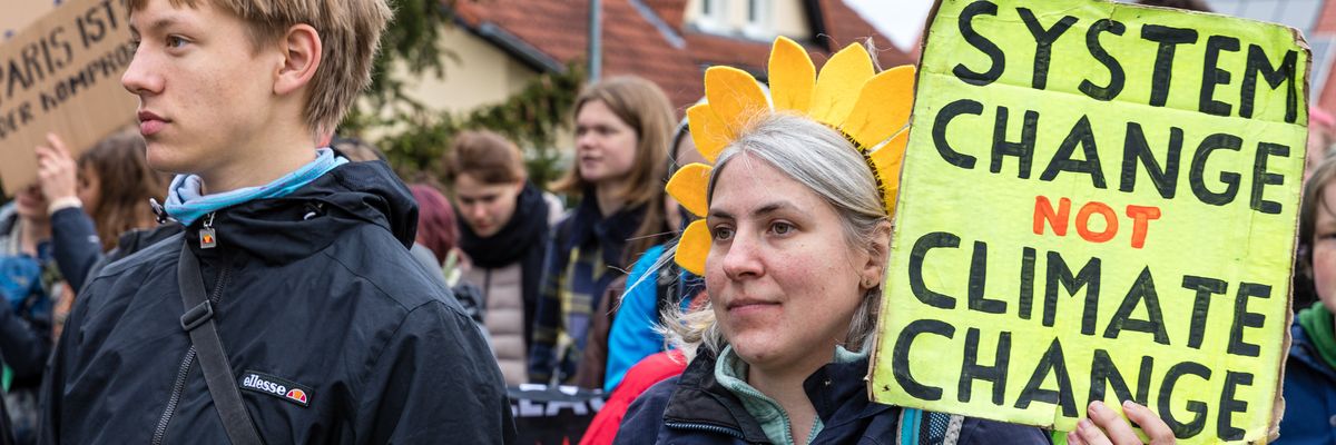 Climate activists attend a protest