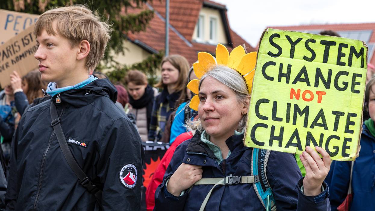 Climate activists attend a protest