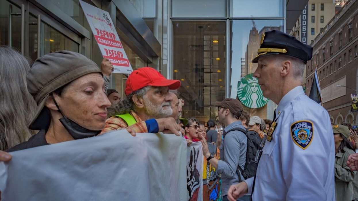 Climate activists block entrance to Bank of America
