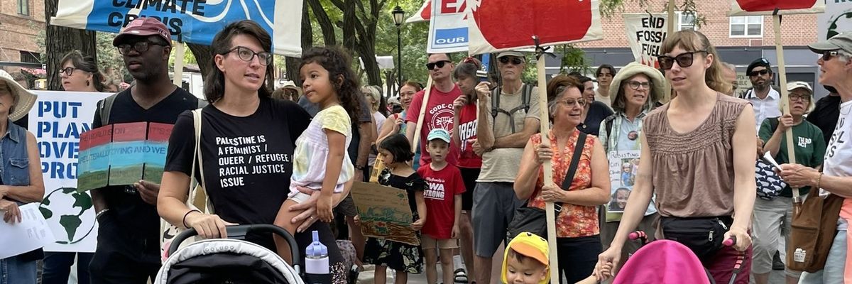 climate activists gathered for a "mom and kids"-themed protest