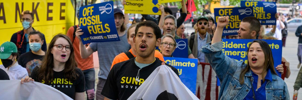 Climate activists marched as President Joe Biden attended a campaign reception