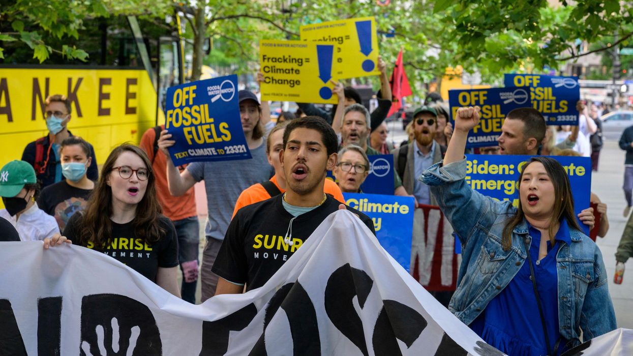 Climate activists marched as President Joe Biden attended a campaign reception