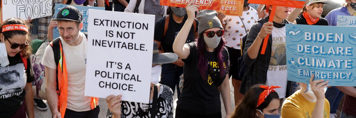 Climate activists participate in a demonstration.