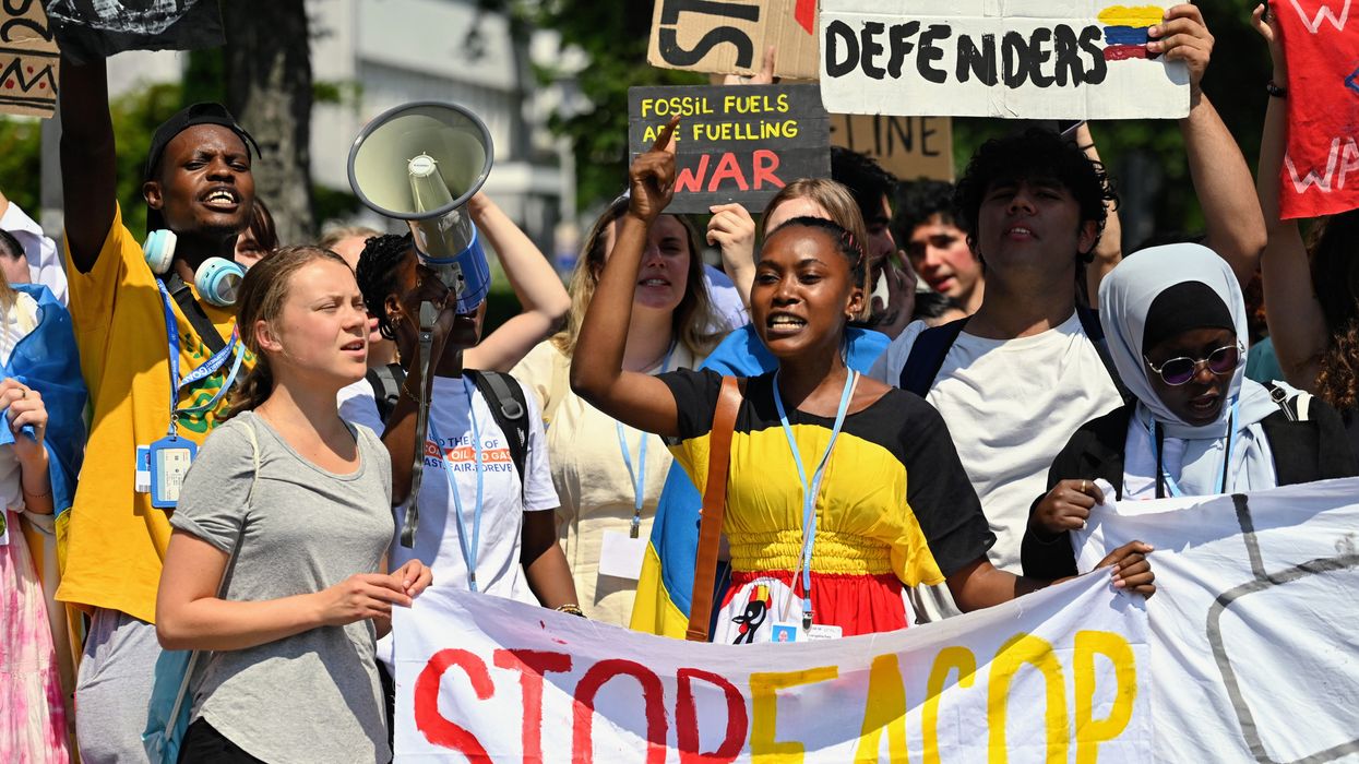 Climate activists protest a planned oil pipeline in East Africa