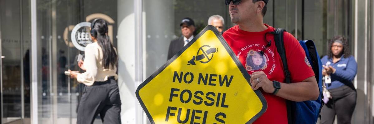 Climate Activists Protest Outside Of Citibank Urging Company To Divest In Fossil Fuels