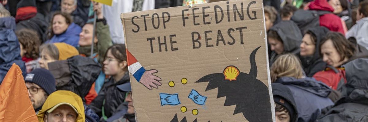 Climate activists stage a sit-in protest