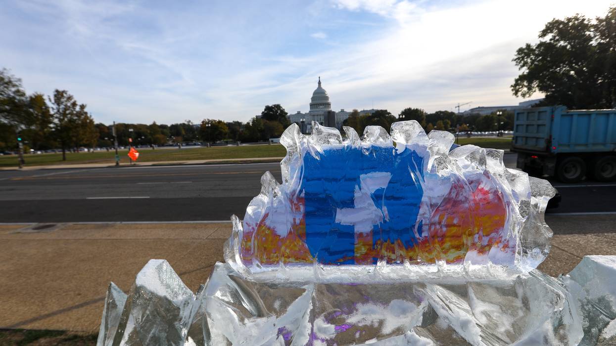 Climate activists target Facebook with an ice display in front of the U.S. Capitol on November 4, 2021 in Washington D.C.