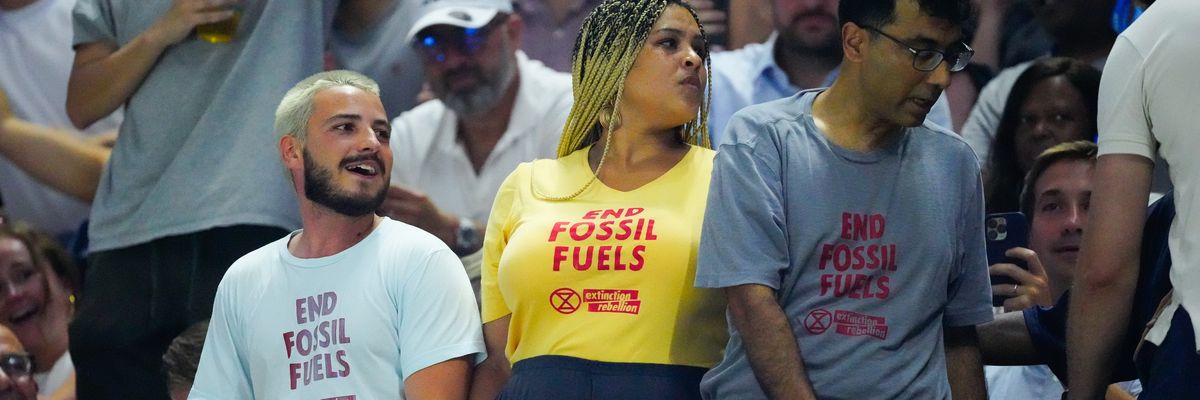 Climate advocates protest at the U.S. Open