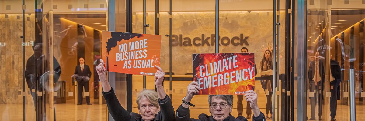 Climate advocates protest outside of BlackRock's headquarters in Manhattan