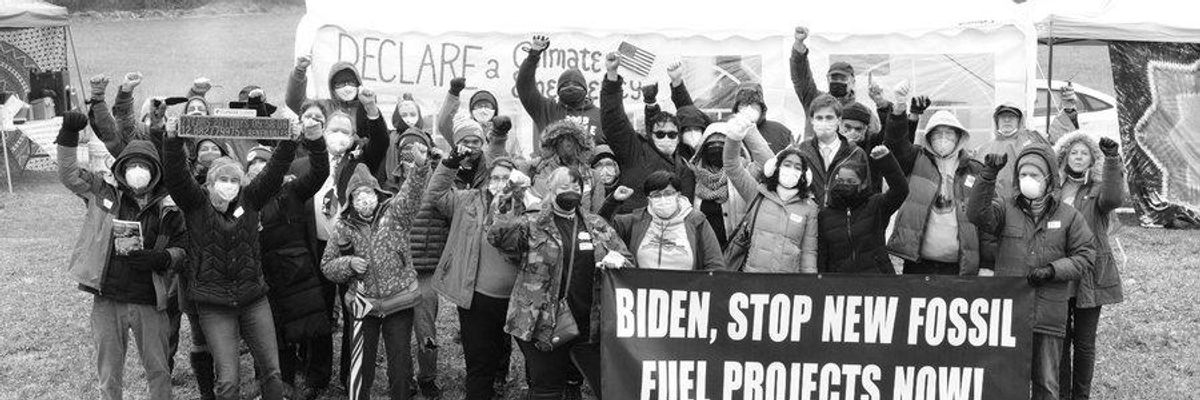 Climate campaigners near Joe Biden's home in Delaware