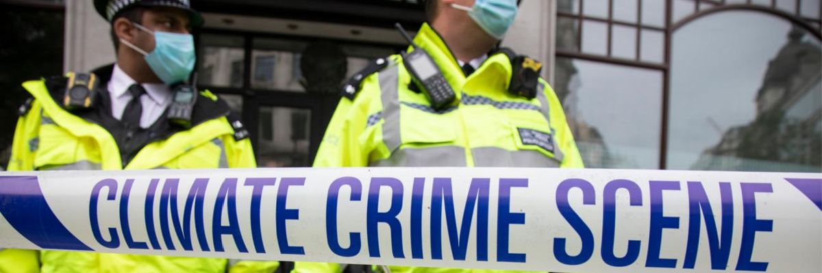 Climate crime scene tape at an Extinction Rebellion protest